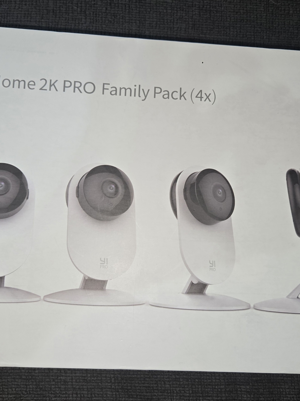 YI 2K Pro Indoor Security Camera (White) - Family Pack Shown